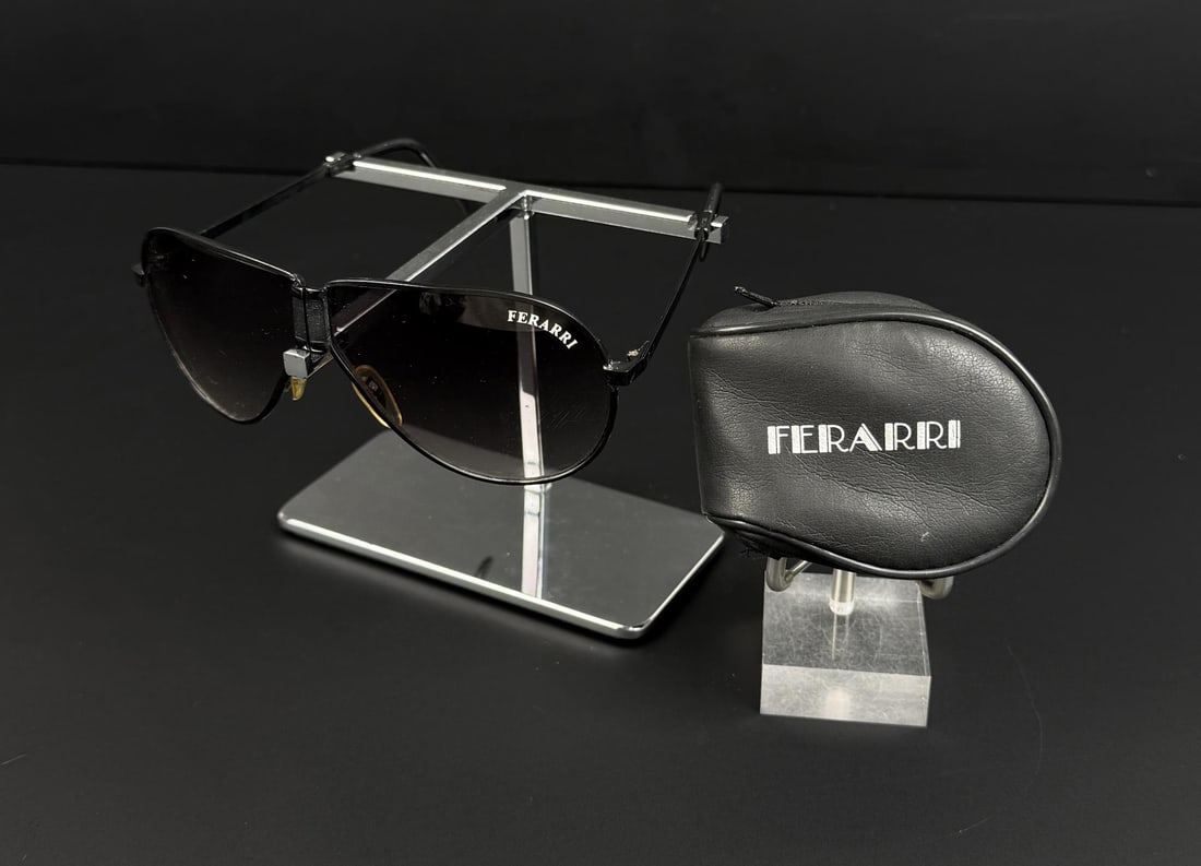Vintage Ferrari Folding Aviator Sunglasses: Nice example. Sold with a leather zip closure case.