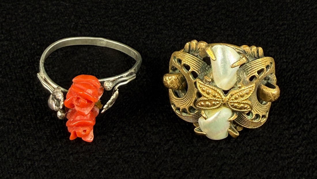 Pair of Art Deco Costume Jewelry Rings: Nice grouping. One features carved coral and is approximately size 6 1/2. The other has features mother of pearl and is size 7 1/4.