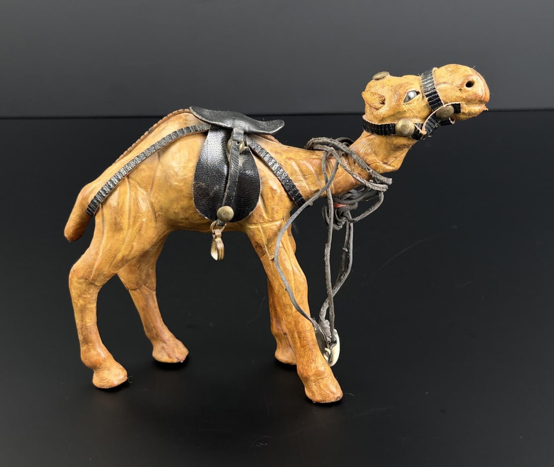 Mid Century Leather Wrapped Camel: 7 3/4" by 6 3/8" by 2 3/4". Complete with Leather Saddle and Bridle.