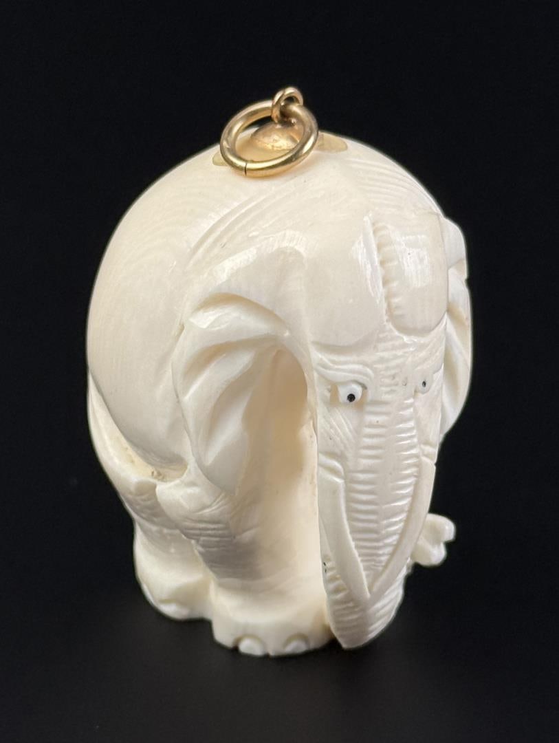 Carved Elephant Pendant Montana Residents Only: 1 5/8" tall. Montana Residents Only. No shipping outside of the state of Montana. Only for sale to Montana Residents. Anyone else bidding, who does not reside in the state will have their bidding