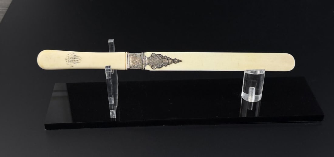 Victorian Page Turner Montana Residents Only: 9 3/4" long. Features sterling silver adornments and a scrimshaw monogram. No sales outside of the state of Montana. Anyone attempting to purchase that resides in a different state will have their bid