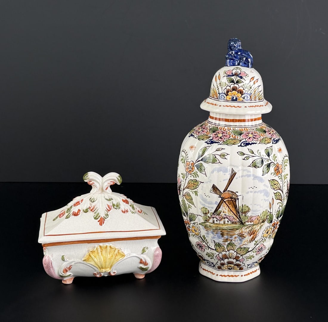 Collection of European Hand Painted Porcelain: Features a Delftware ginger jar from the De Delftse Pauw factory in the Netherlands. Its pattern number is 39, and stands 11 7/8" tall.