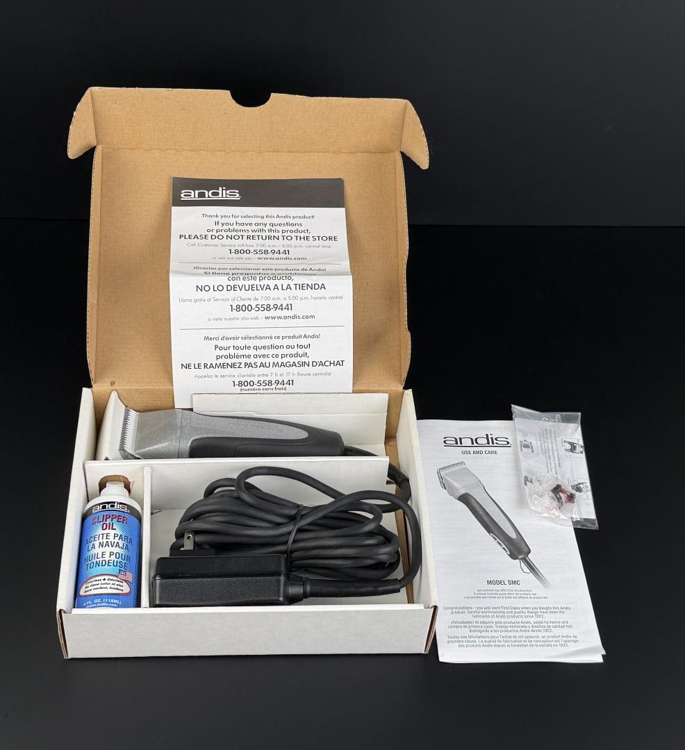 Andis Model SMC Professional Hair Clippers: Features a detachable blade system compatible with Andis UltraEdge and CeramicEdge blades. In working order.