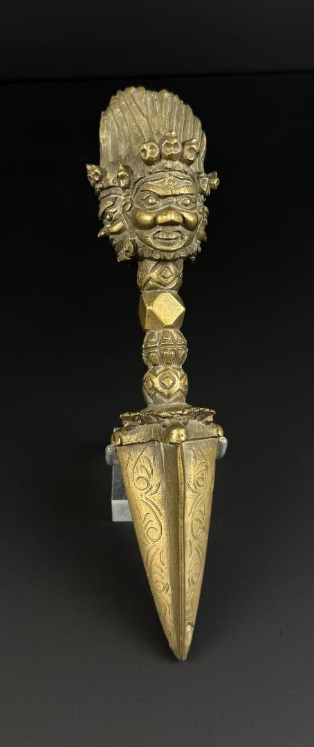 Tibetan Phurba Ritual Dagger: 2" by 8 3/8" long.