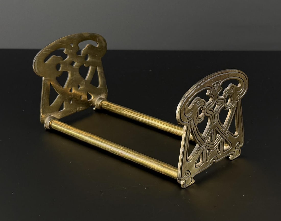 Brass Telescoping Bookends: 4" by 4 3/8" by 8 3/8" 8 3/8" long.