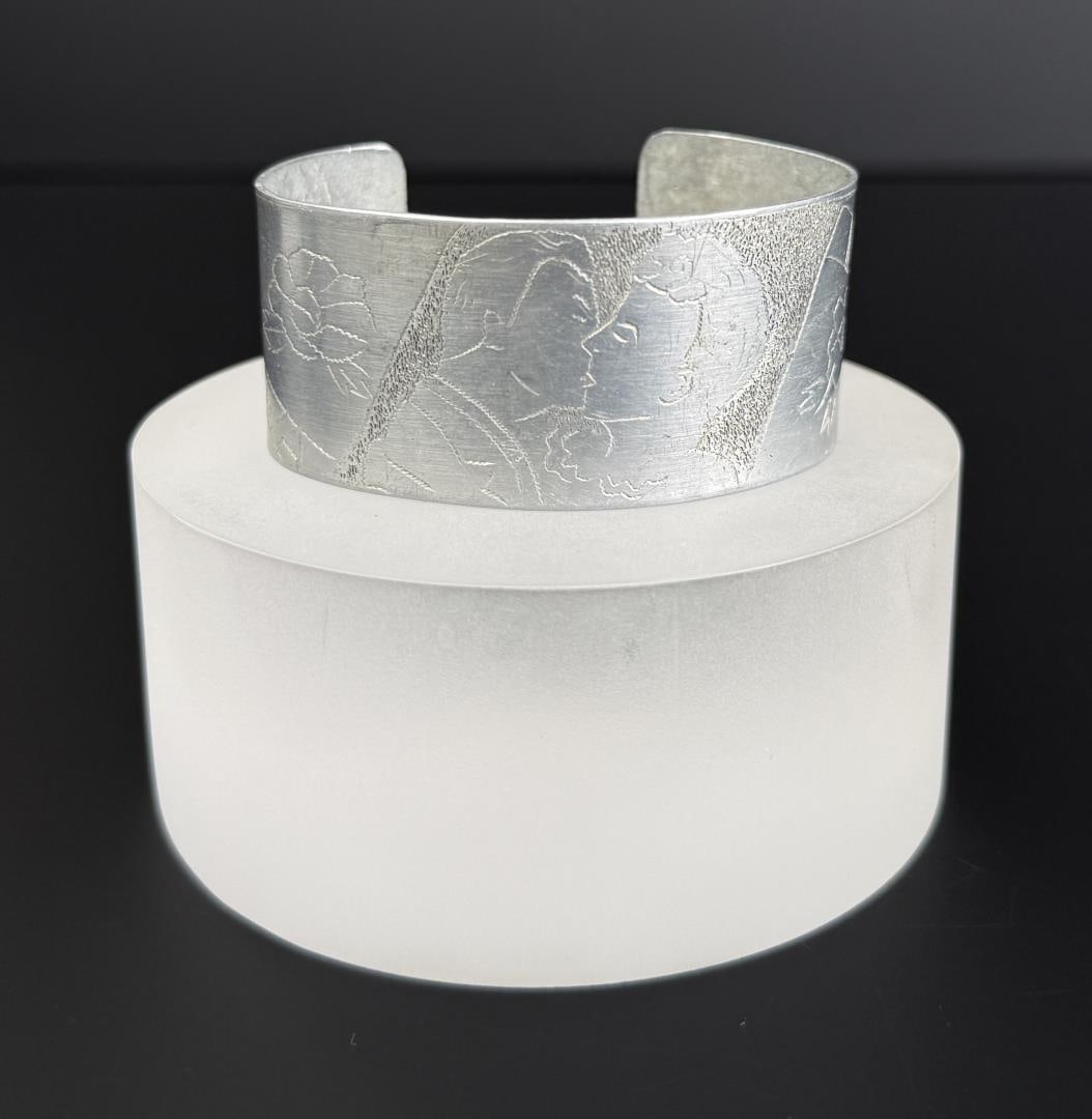 WW2 Trench Art Sweetheart Cuff Bracelet: Engraved aluminum, 6 to 6 1/2" inner circumference as shown.
