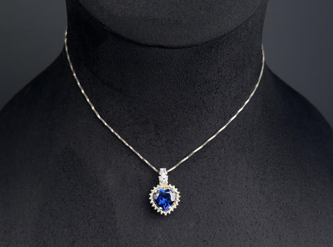 Sterling Silver Heart Pendant Necklace: 7.34 grams. 10 1/2" long as displayed.