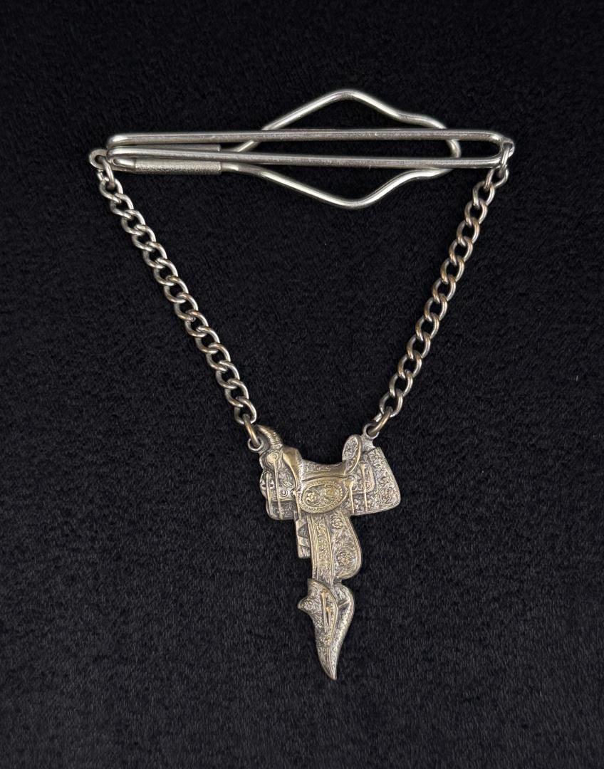 Western Cowboy Saddle Tie Bar: 2 1/4" wide, 3 3/8" long.