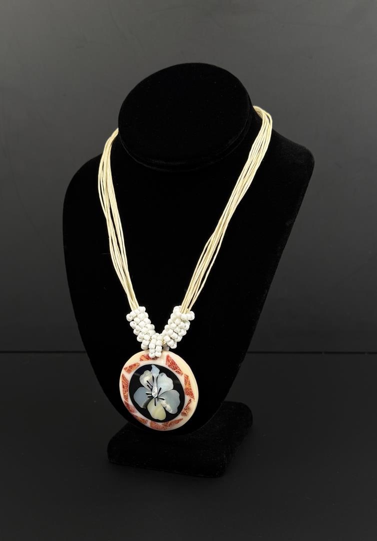 Hawaiian Mother of Pearl Pikake Necklace: 10 7/8" long as displayed. Coral and mother of pearl inlays.