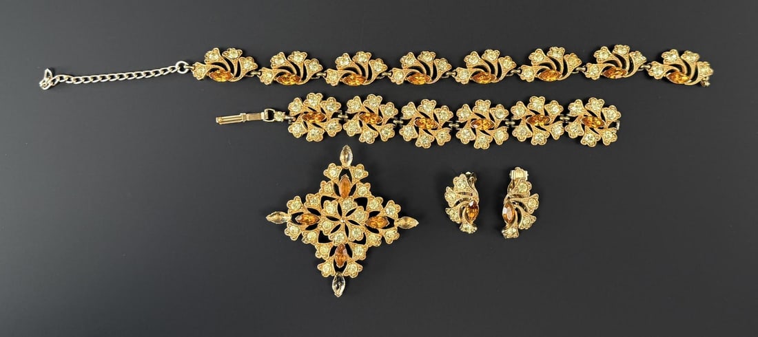 Costume Jewelry Rhinestone Suite: Includes necklace, bracelet, clip on earrings, and brooch.