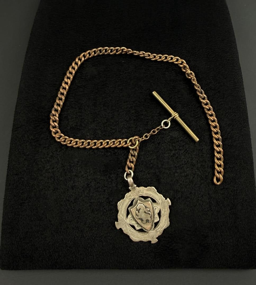 1928 Scottish Silver Cross Country Watch Fob Chain: 11 7/8" long. Made by Charles Edward Soloman, 1897. Fob is Silver, Chain is Gold Filled. Fob weighs 14.87 grams.