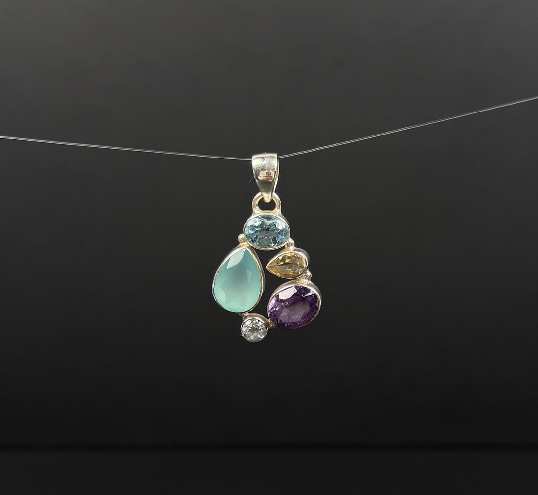 Sterling Silver Semi Precious Stone Pendant: 8.36 grams. 1 1/4" long.