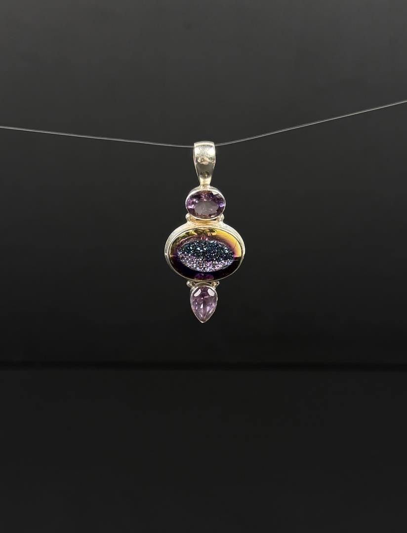 Sterling Silver Druzy Amethyst Pendant: 7.57 grams. 1 5/8" long.