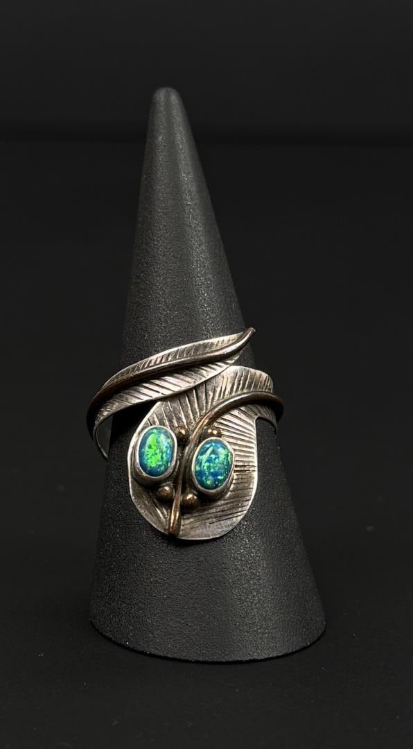 Ethiopian Opal Sterling Silver Ring: 4.73 grams. Size 10
