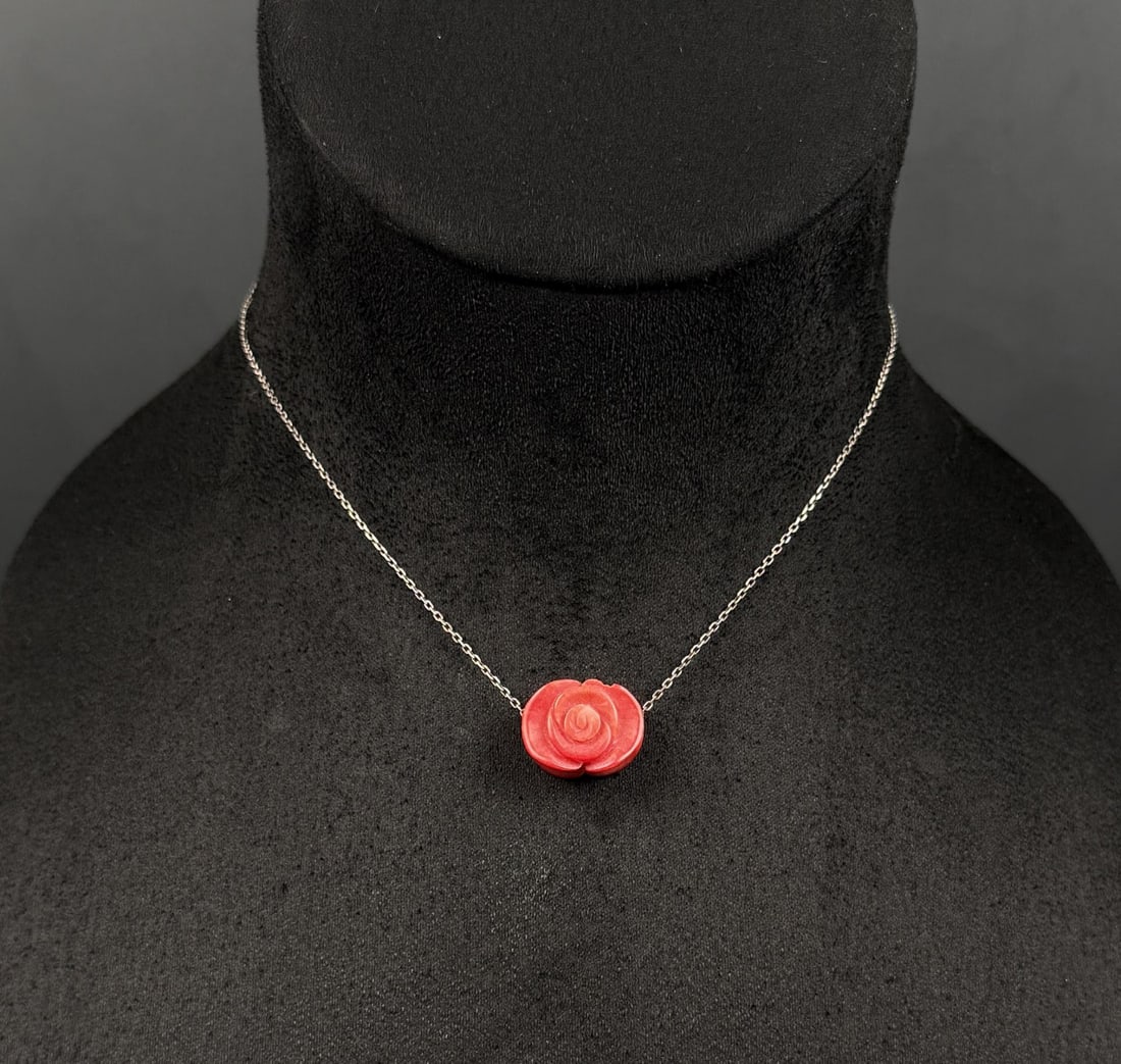 Sterling Silver Coral Necklace: 9 3/4" long as displayed. 5.14 grams.