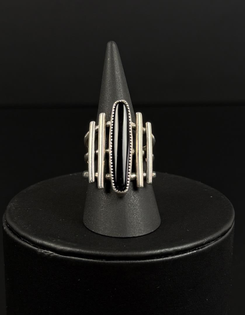 Navajo Sterling Silver Onyx Ring: 12.2 grams. Size 11 1/2.