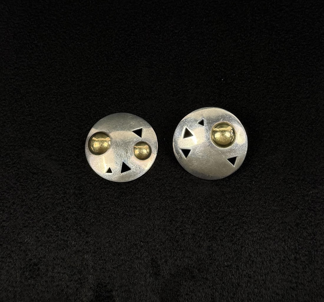 John Atencio Sterling Silver 18k Gold Earrings: One earring is missing a post. 11.22 grams. 1" diameter.