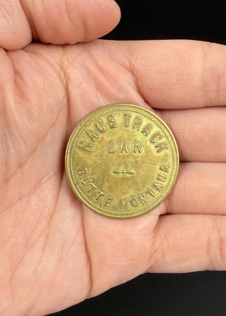 Race Track Bar Butte Montana Token: $1 in trade.