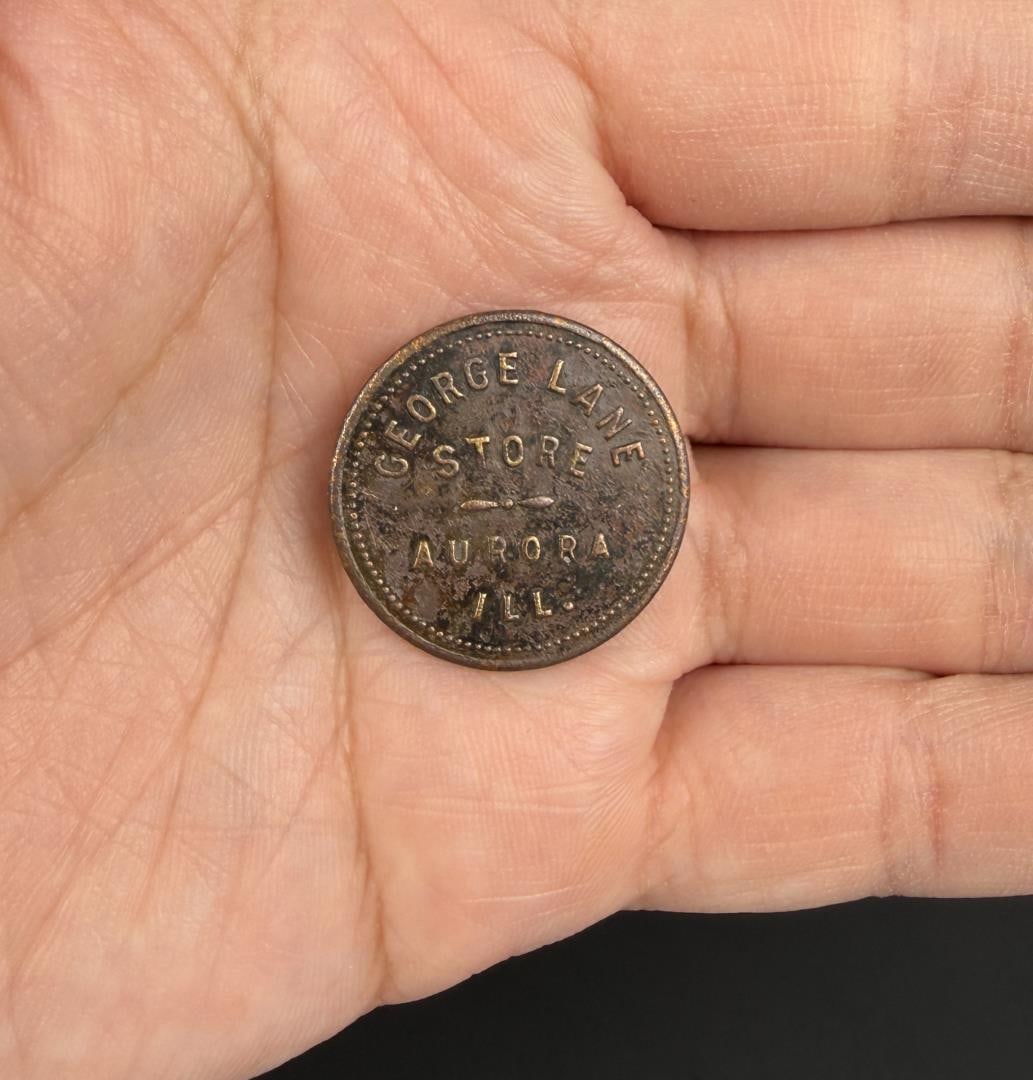 George Lane Aurora Illinois Token: 25c in trade.