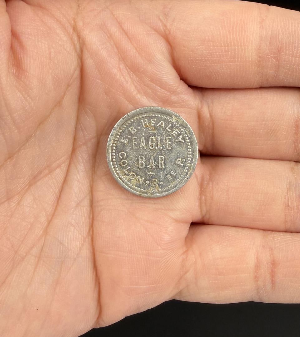 Eagle Bar Colon Republic of Panama Token: E.B. Healey. Good for 5c in merchandise.