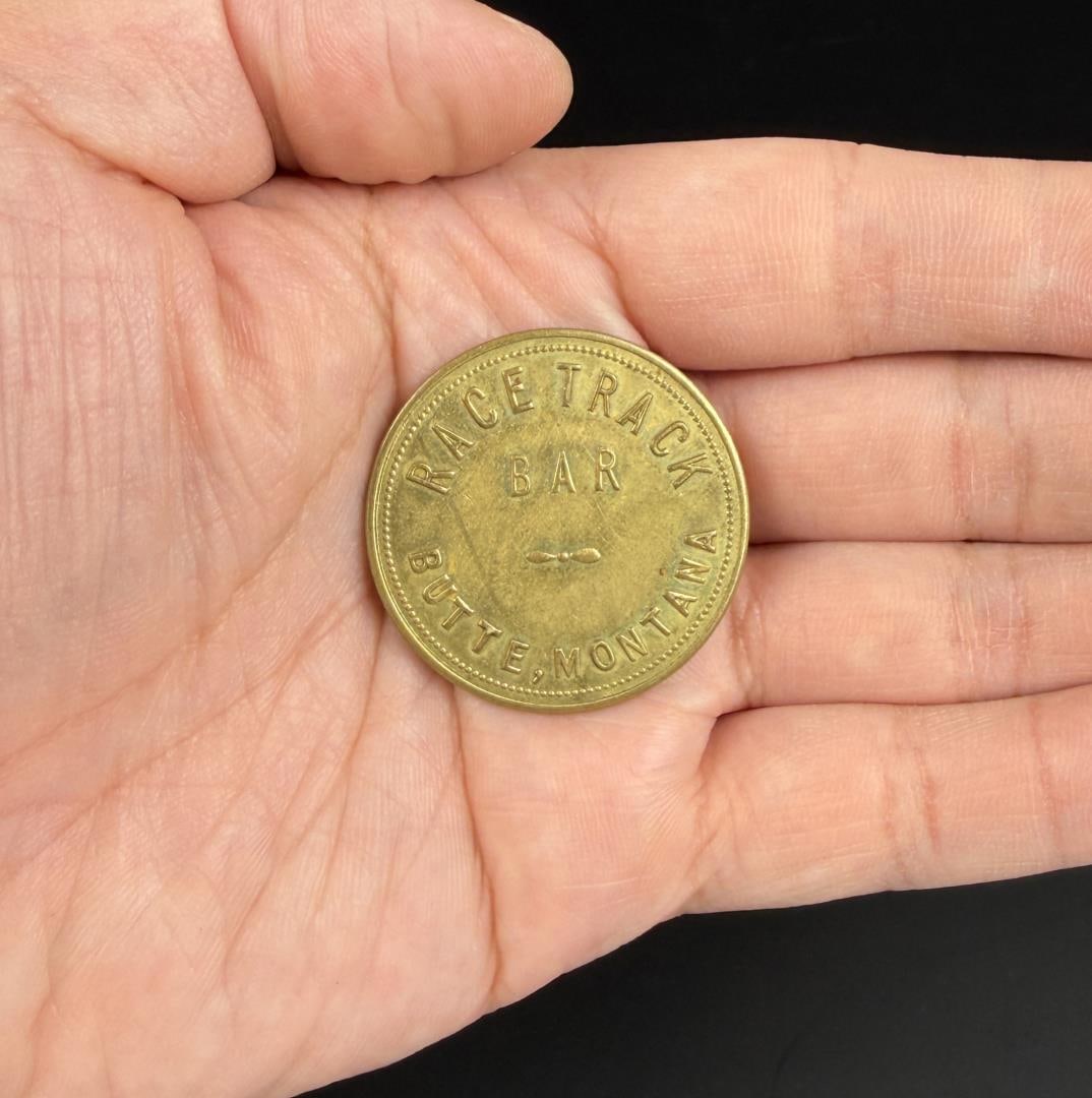 Race Track Bar Butte Montana Token: $1 in trade.