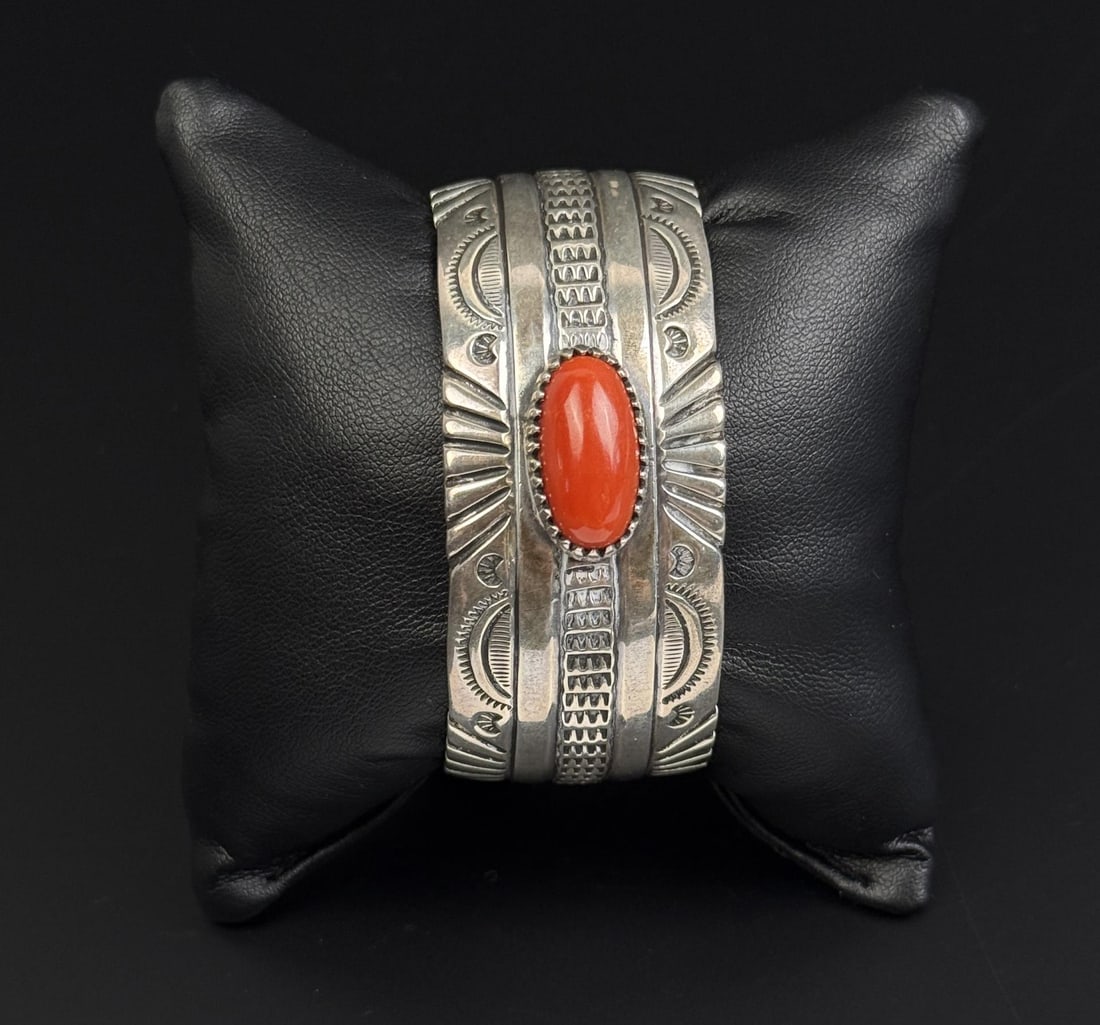 Thompson Platero Navajo Sterling Coral Bracelet: 68.9 grams. 5 3/4" inner circumference.