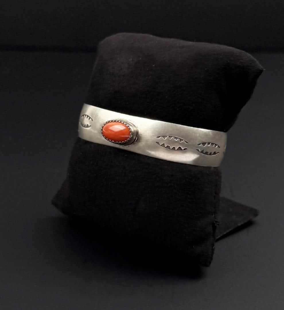 Navajo Sterling Silver Coral Bracelet: 25 grams. 5" inner circumference.