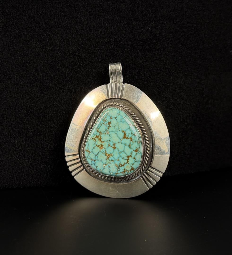 Navajo Sterling Silver Turquoise Pendant: 34.8 grams. 2 1/8" by 2"