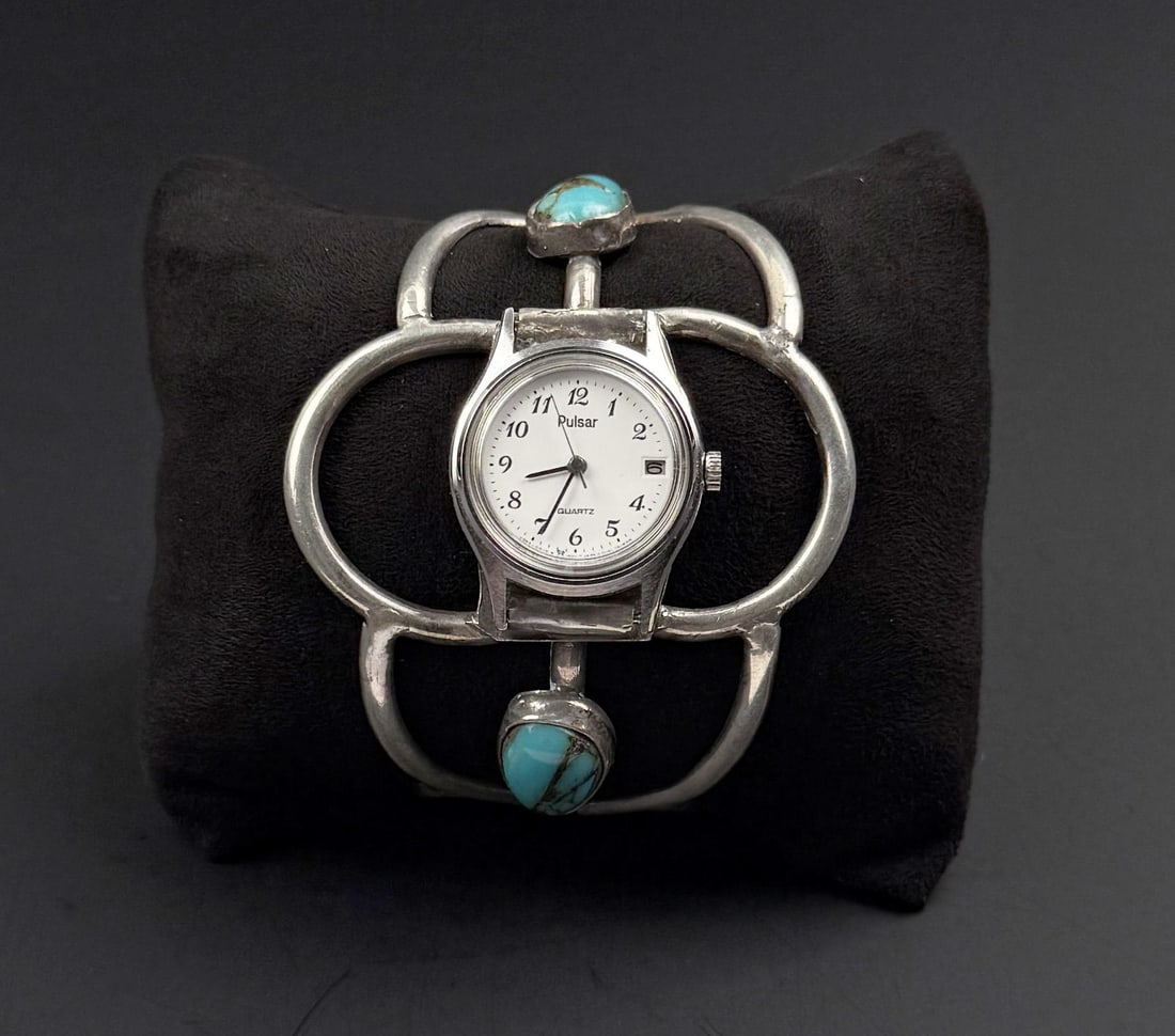 Navajo Sterling Silver Turquoise Watch Bracelet: 40.1 grams. 5 1/4" inner circumference.