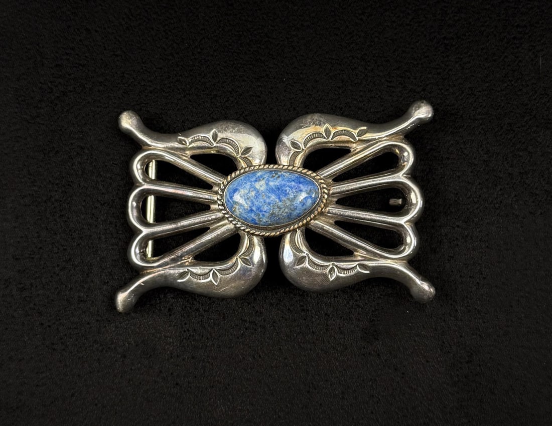 Wilson Begay Navajo Sterling Silver Belt Buckle: 66.75 grams. 2" by 3 1/4".