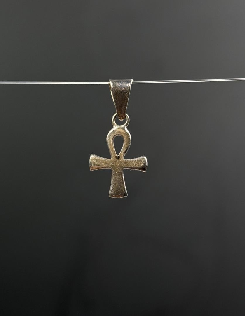 Egyptian Ankh Sterling Silver Pendant: 1.06 grams. 7/8" long.