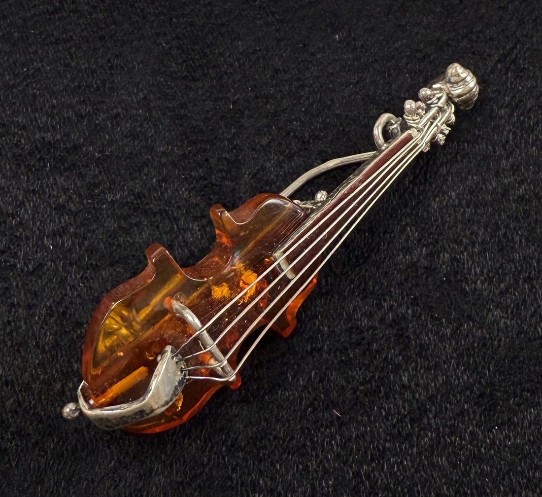 Sterling Silver Baltic Amber Violin Brooch: 6.39 grams. 2 1/8" long.