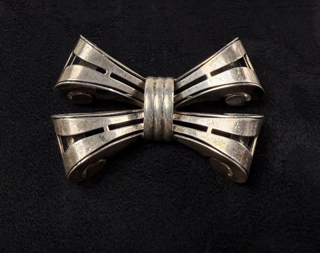 Monet Sterling Silver Bow Brooch: 31.61 grams. 2 3/4" by 1 7/8".