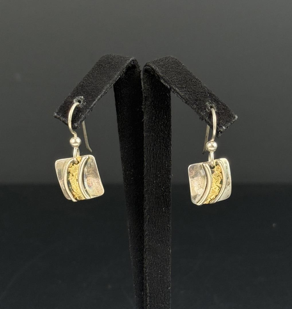 Sterling Silver Earrings: 3/4" long. 2.32 grams.