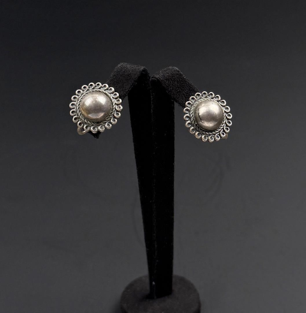 Concho Style Sterling Silver Earrings: 1/2" diameter. 6.28 grams.