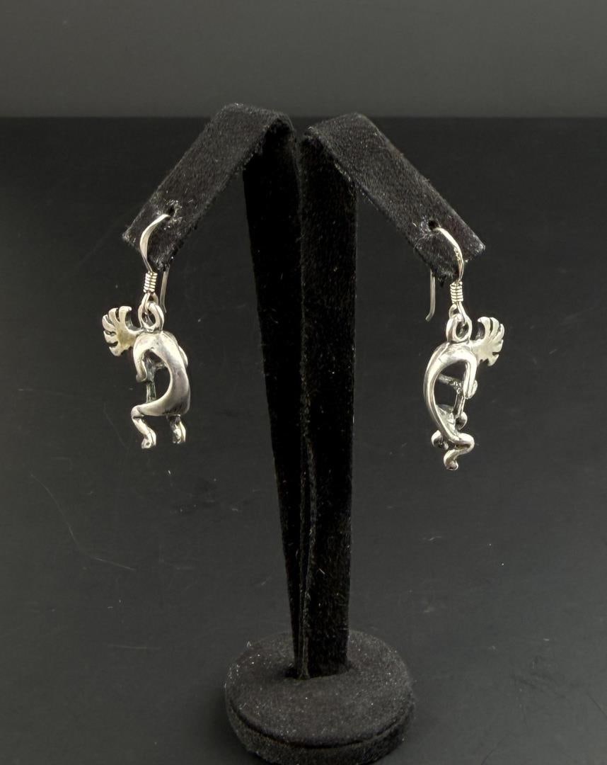Sterling Silver Kokopelli Earrings: 1 1/4" long. 5.12 grams.