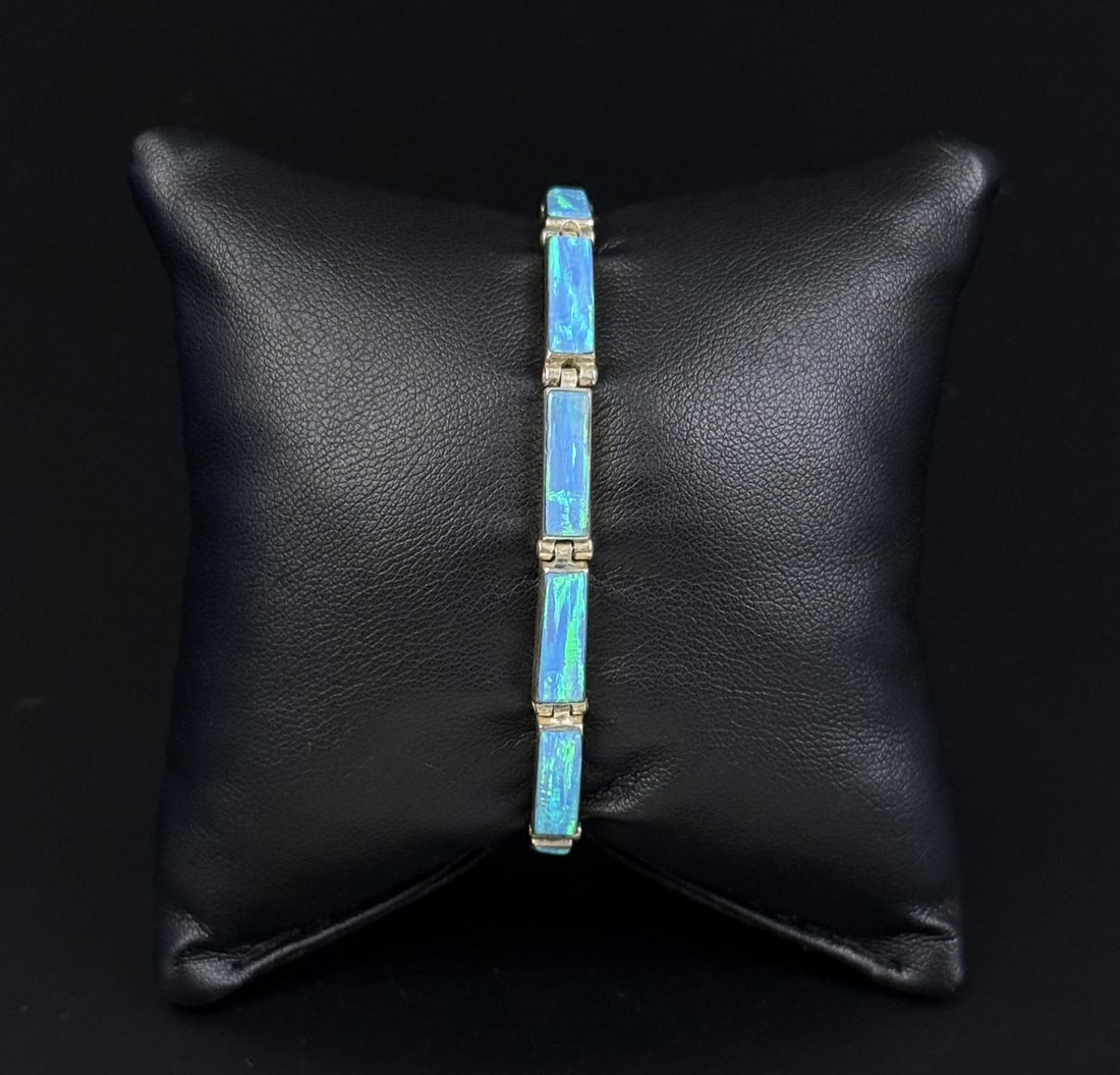 Taxco Mexico Sterling Silver Blue Opal Bracelet: 9.86 grams. 6 3/4" inner circumference.