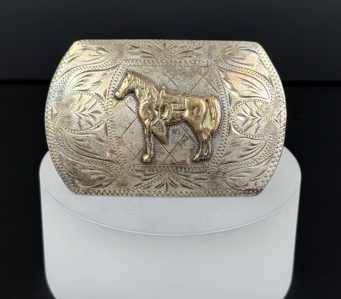 Ricardo Sterling 10k Gold Cowboy Belt Buckle: 39.69 grams. 2" by 3".