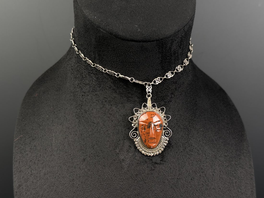Taxco Mexico Sterling Aztec Necklace: 11 1/2" long as displayed. 22.81 grams.