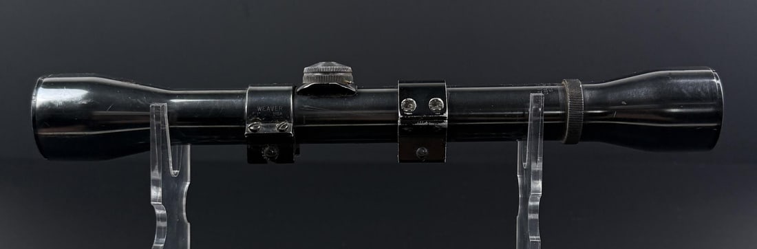 Weaver K4 60C Rifle Scope: German Post and Bar Reticle. There is some spotting on the scope lens, as well as a scuff.