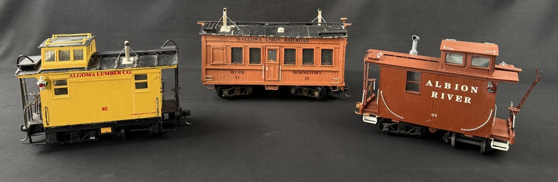 Collection of Brass Body G Scale Cabooses: Custom Painted and Decaled.