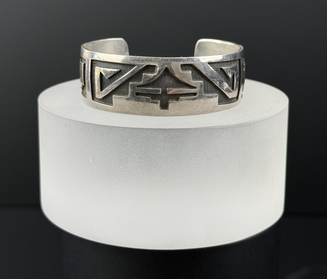 Hopi Sterling Silver Bracelet: 5" internal circumference. 34.94 grams. Signed CNC.