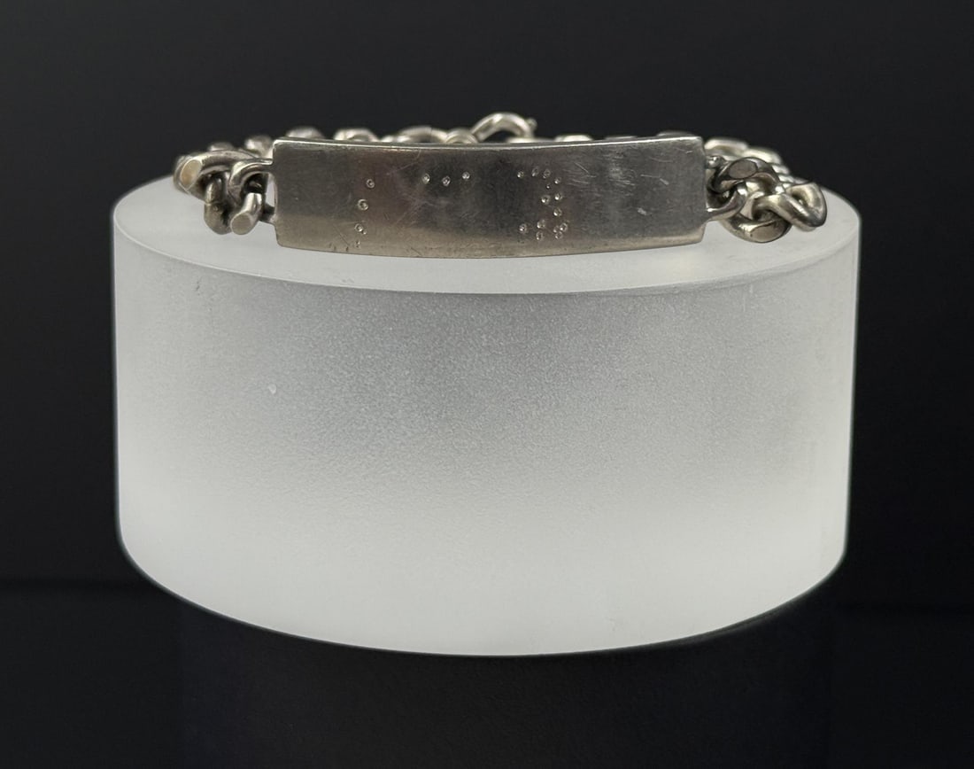 Elco Sterling Silver Identification Bracelet: 7 1/4 internal circumference. 44.15 grams.