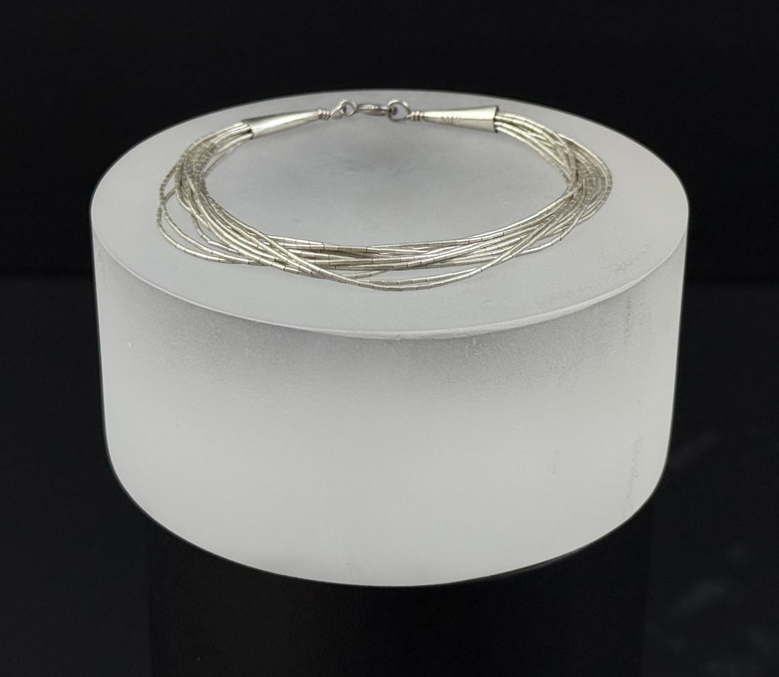Navajo Liquid Sterling Silver Bracelet: 7" internal circumference. 4.96 grams.