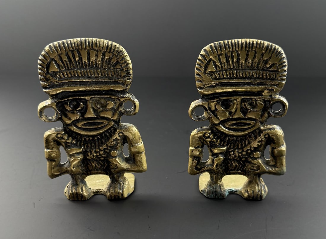 Mid Century Mayan Warrior Brass Bookends: Each bookend is 4 1/2" by 3" by 1 7/8".
