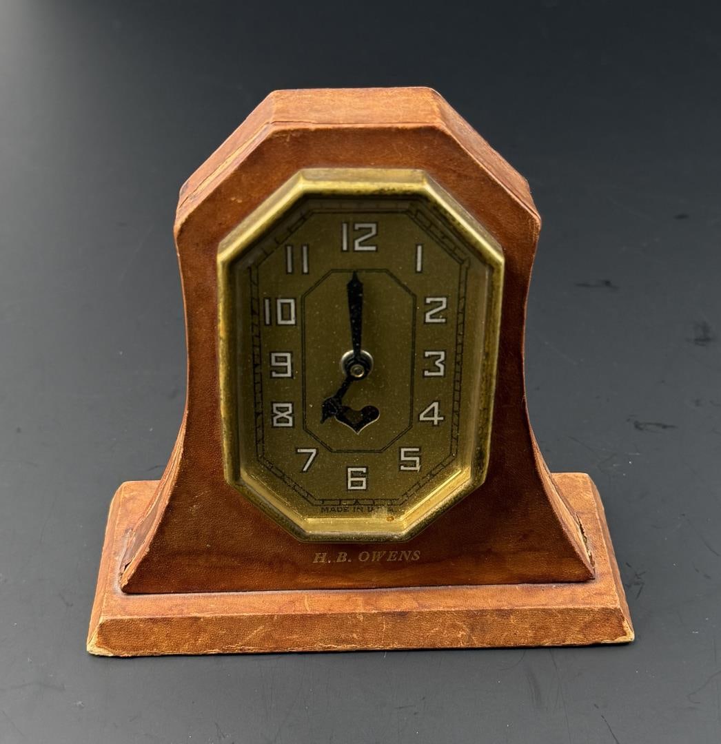 Art Deco Leather Wrapped Lux Desk Clock: 5 1/4" by 4 3/4" by 2 1/4". Retailed by Appling & Rodman, Inc. of Fresno, California.