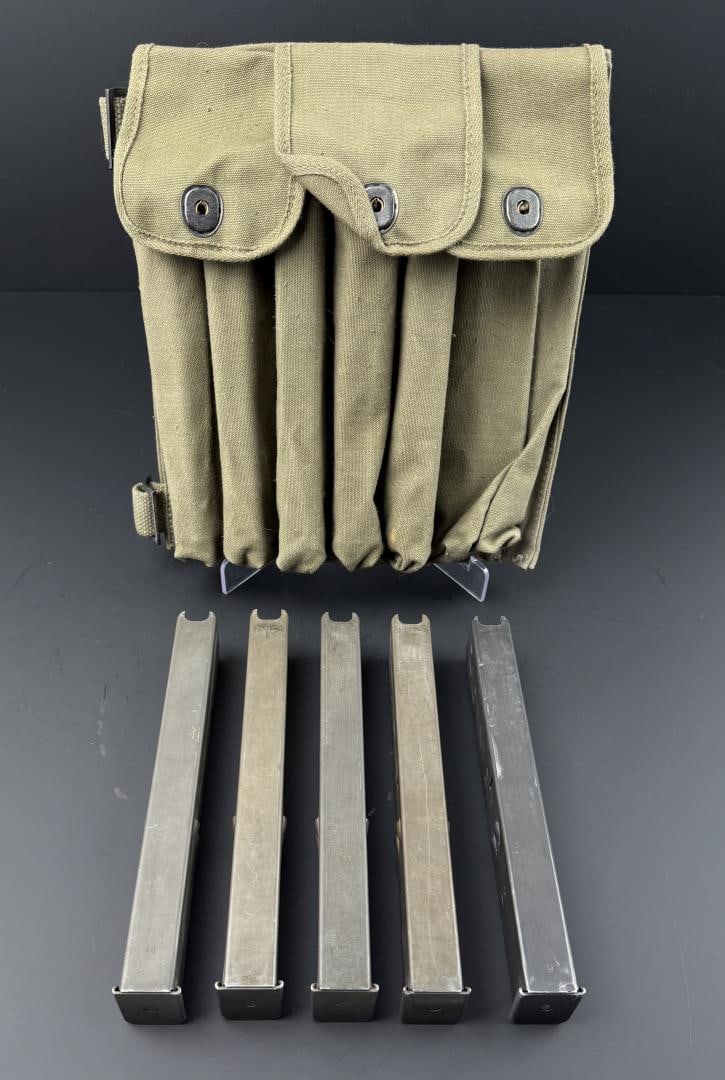 5 32 Round Uzi Magazines in 7 Cell Pouch: Mismatched pouch and magazines. The pouch is a WW2 Thompson Gun 7 Cell Magazine Pouch. No sales to the following areas, a bid from any of these restricted areas will result in immediate termination of