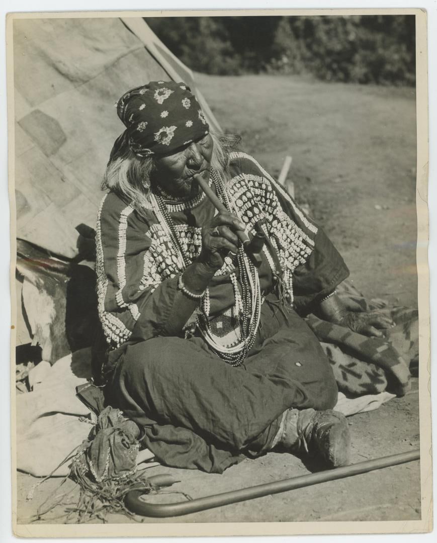 Calf Tail Blackfoot Indian Montana Photo: Title is Mrs. Calf Tail of the Glacier National Park Reservation. 8" by 10". Signed on the back by Helen Fitzgerald.