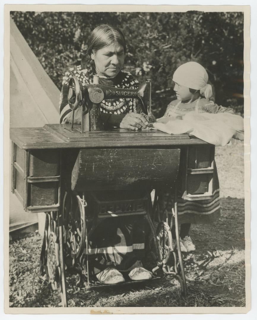 Glacier Park Blackfoot Indian Montana Photo: The Bone Needle and Sinew Gives Way to the Machine. 8" by 10".