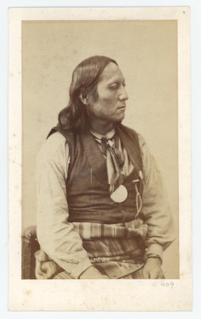 Alexander Gardner Son of the Sun Kiowa Photo: 4 1/2" by 7 1/2". Son of the Sun is the name of the tribal culture hero who brought the Tai-me or Ten Grandmother bundles to the tribe, the center and basis of Kiowa religious belief. Only a man from 